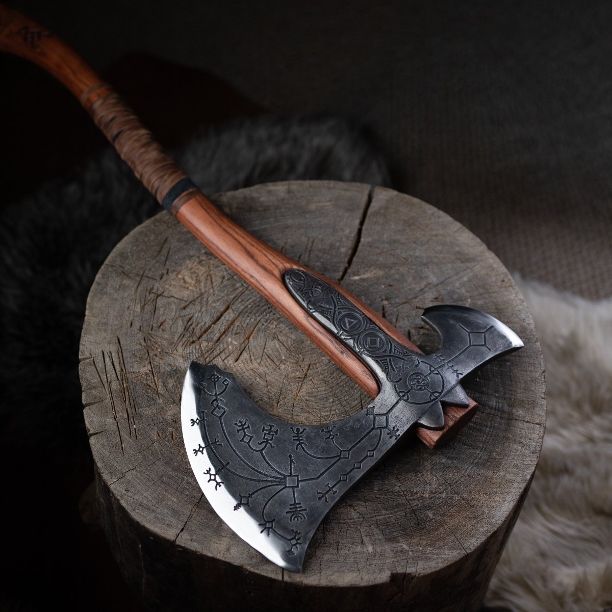 Hand-forged Leviathan axe with leather wrap from AncientSmithy
