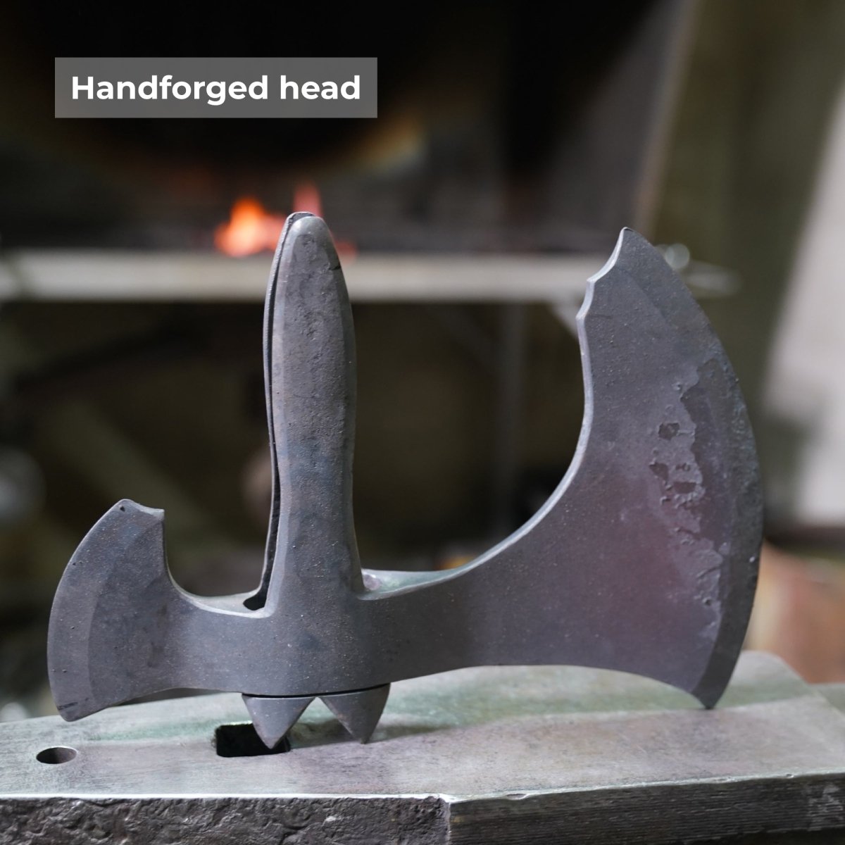 Hand-forged "Ragnarok Kratos axe" with carved handle and Luminescent runes from AncientSmithy