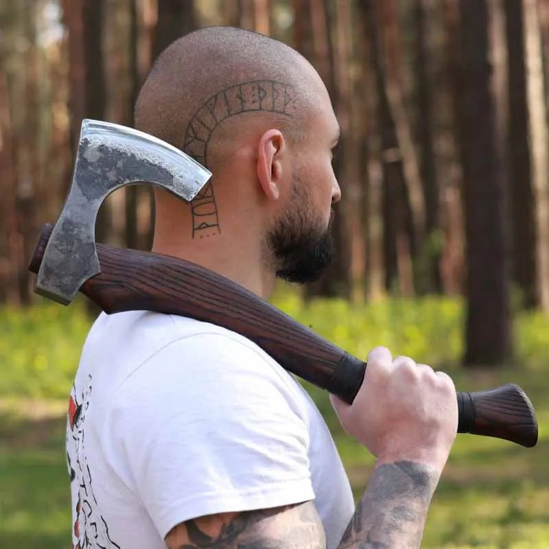 Hand forged Viking axe "Svart barbar" with carved handle from AncientSmithy