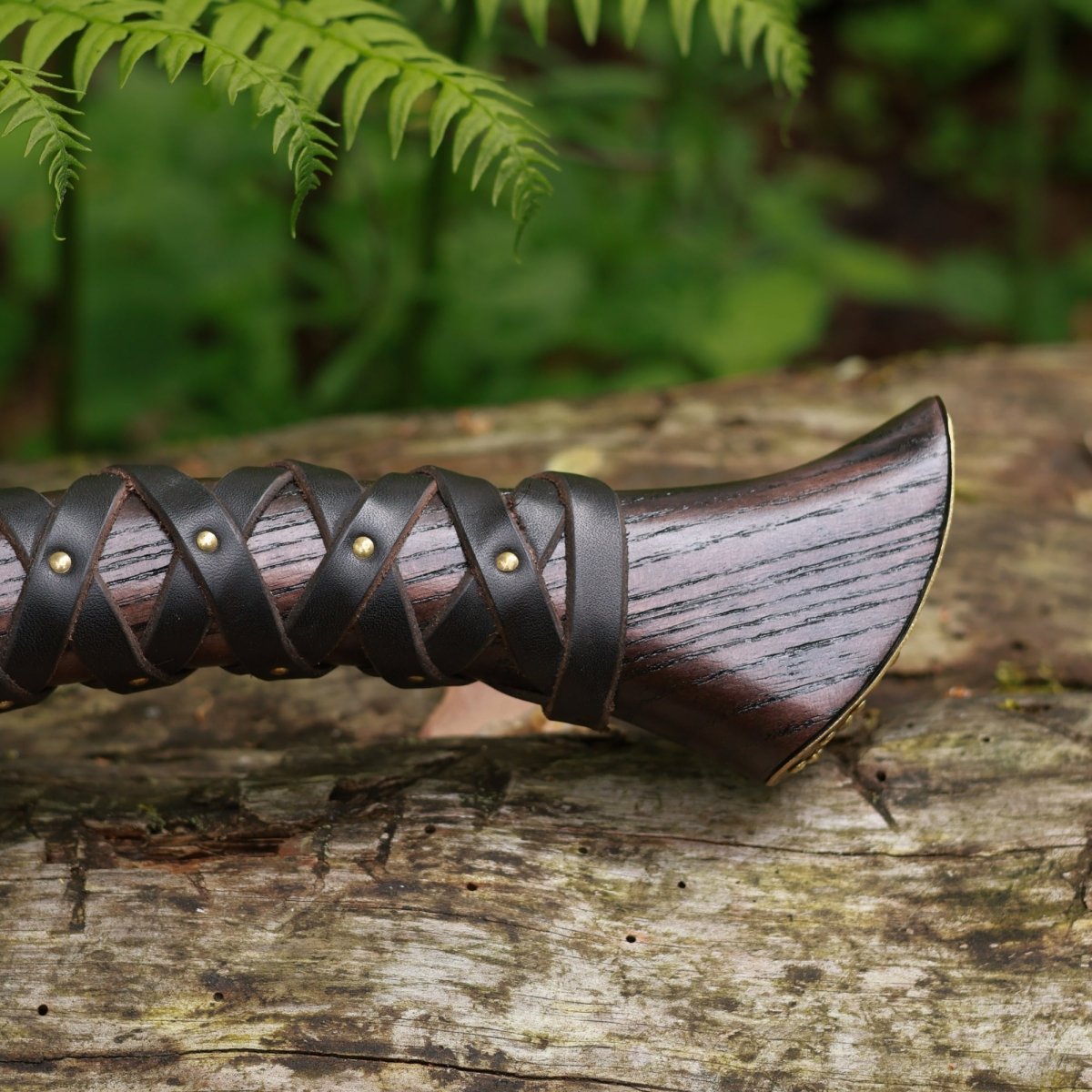 Hand Forged Viking Axe "Veles" with leather wrap on the handle from AncientSmithy