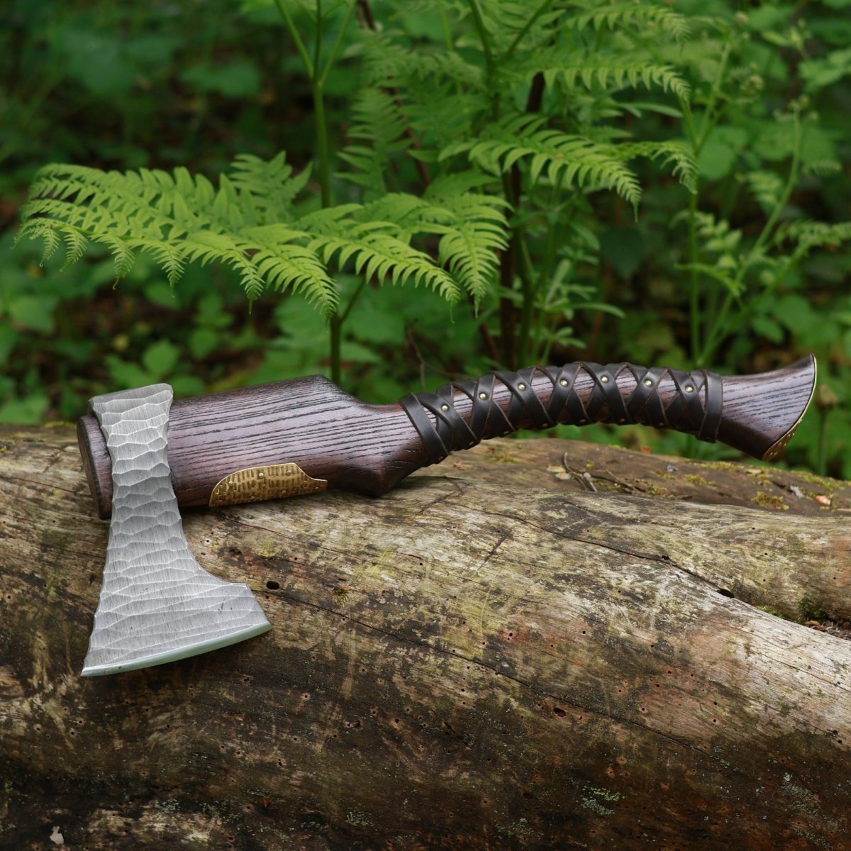 Hand Forged Viking Axe "Veles" with leather wrap on the handle from AncientSmithy