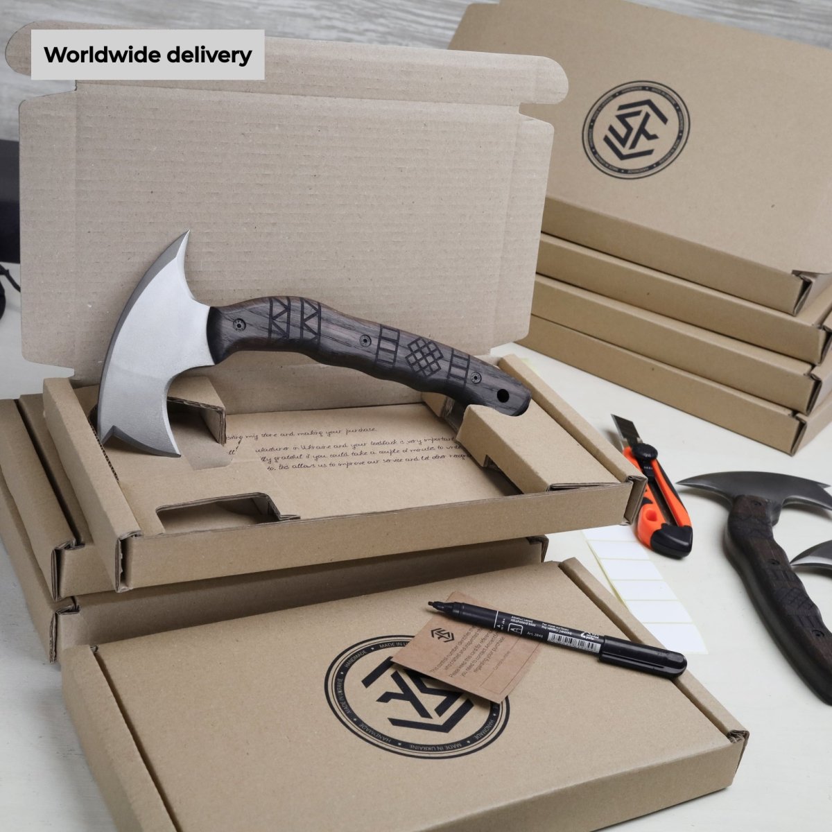 Handmade tomahawk "Dakuri" with tribal engraving from AncientSmithy