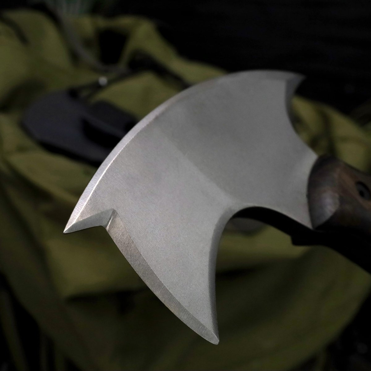 Handmade tomahawk "Dakuri" with tribal engraving from AncientSmithy
