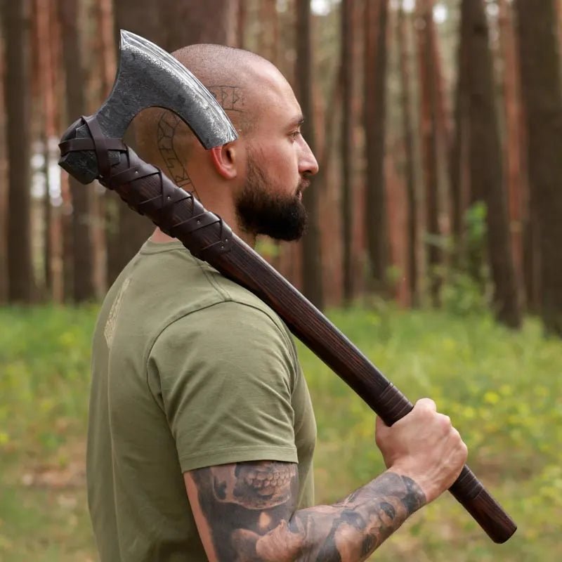 Viking long axe "Ragnar Lodbrok" with carving handle and leather wrap from AncientSmithy