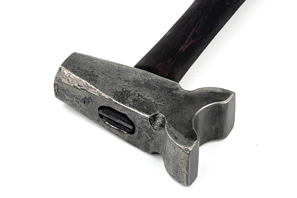 Top swage hammer with different work zones
