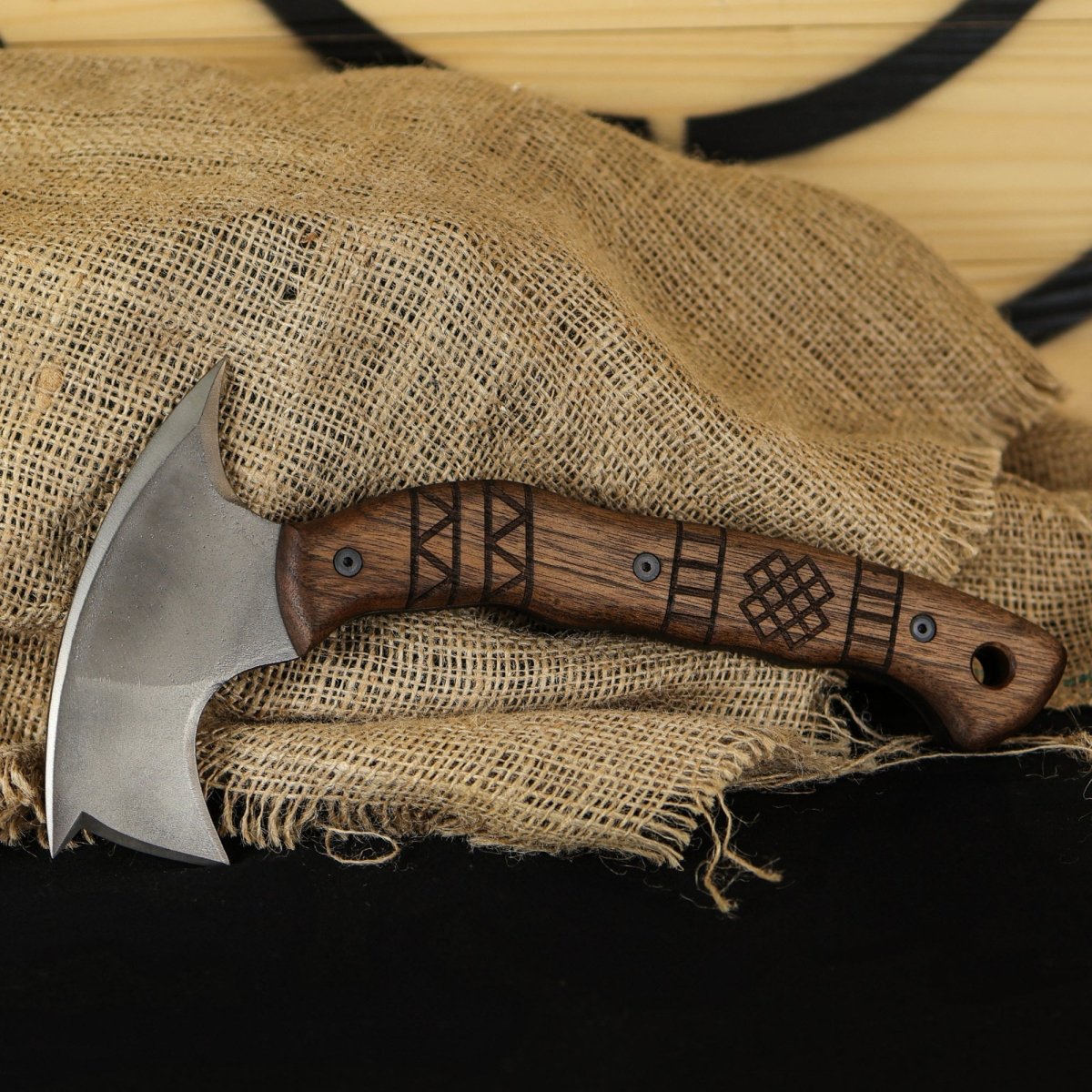 Forged tomahawk "Skaldrun" with tribal engraving from AncientSmithy