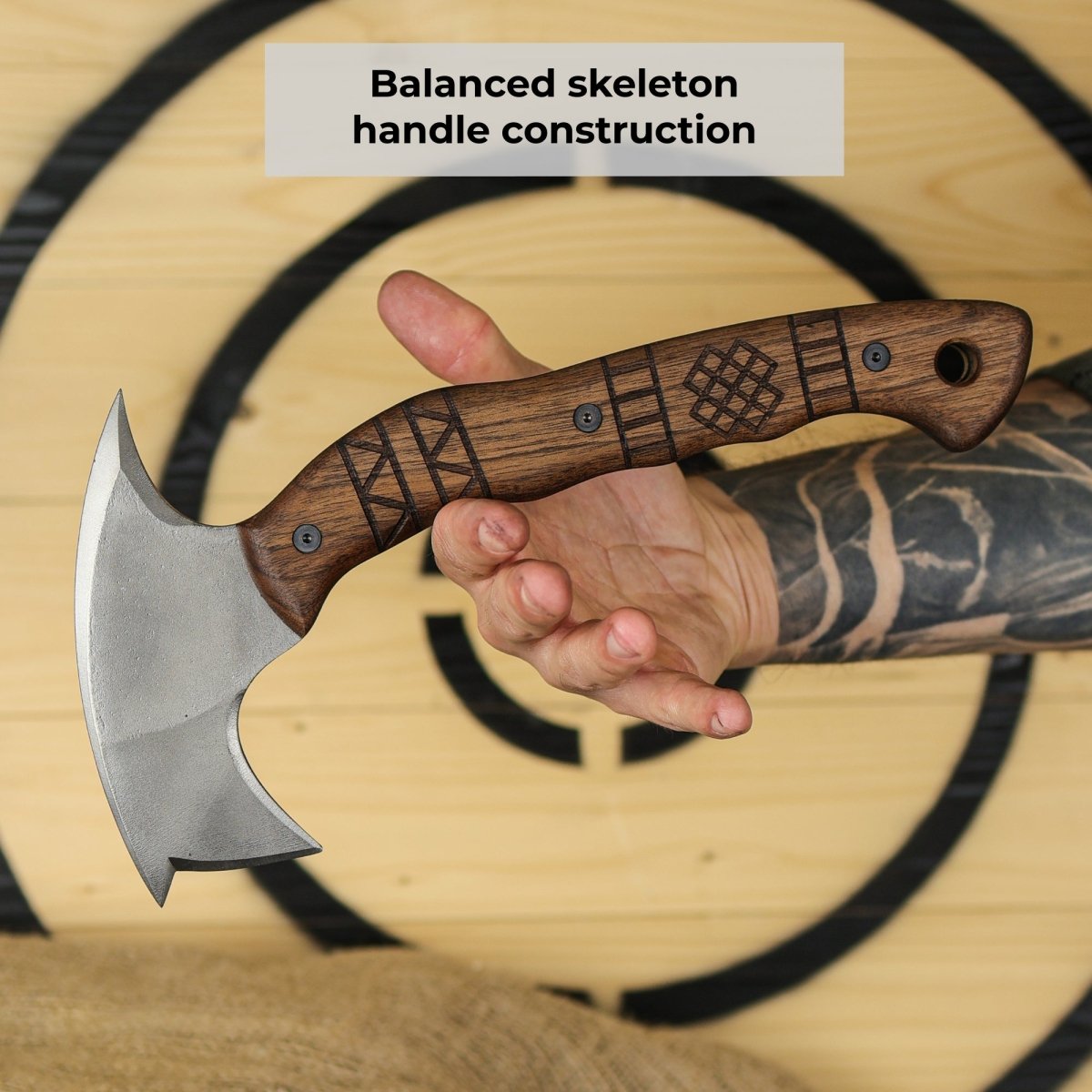 Forged tomahawk "Skaldrun" with tribal engraving from AncientSmithy