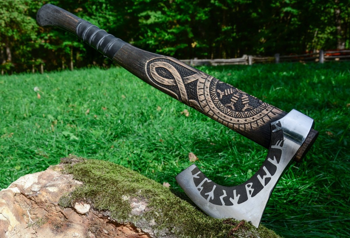 Hand forged axe “OTHALA” with leather cover from AncientSmithy