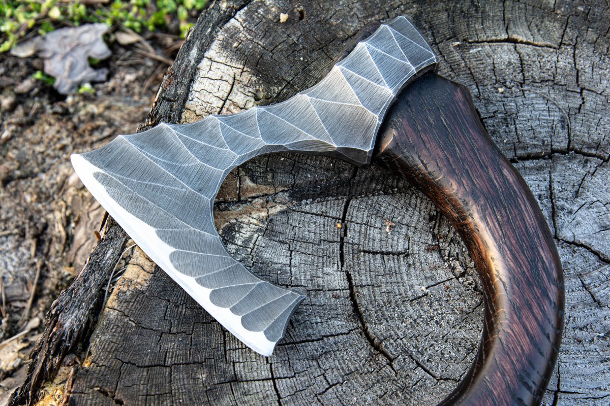 Hand forged hatchet "Skarpt nebb" with leather cover from AncientSmithy