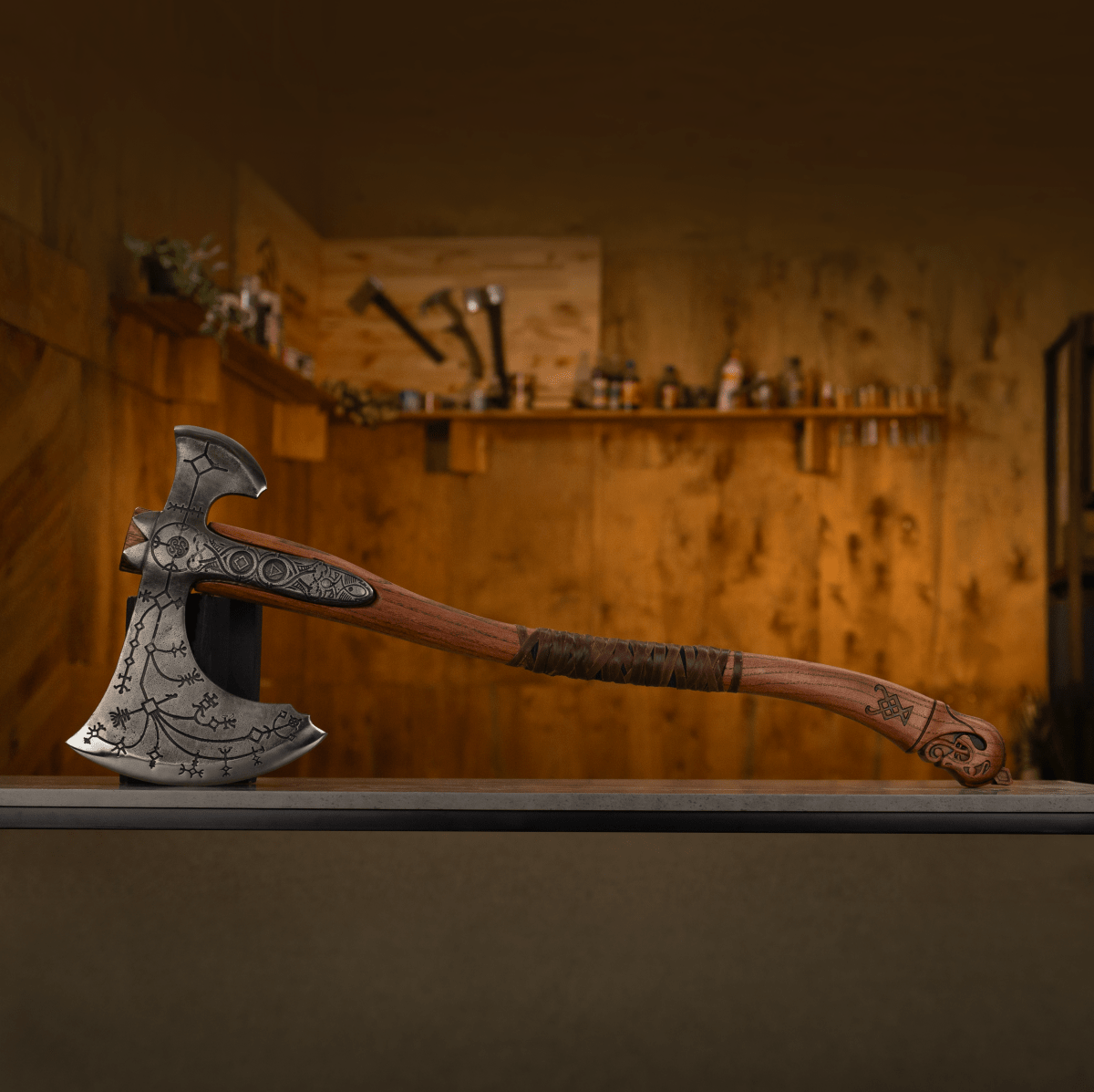 Hand-forged Leviathan axe with leather wrap from AncientSmithy