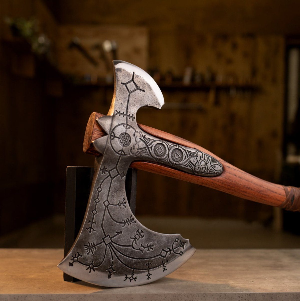 Hand-forged Leviathan axe with leather wrap from AncientSmithy