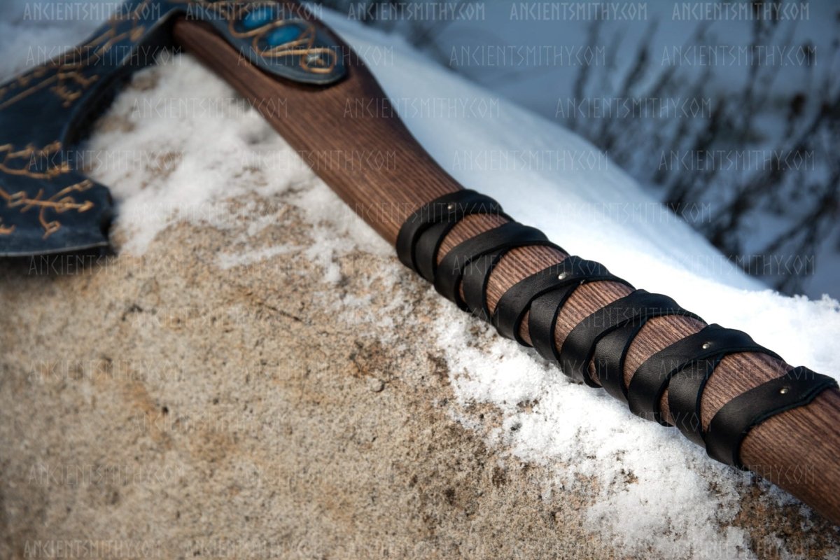 Hand - forged Leviathan axe with leather wrap from AncientSmithy