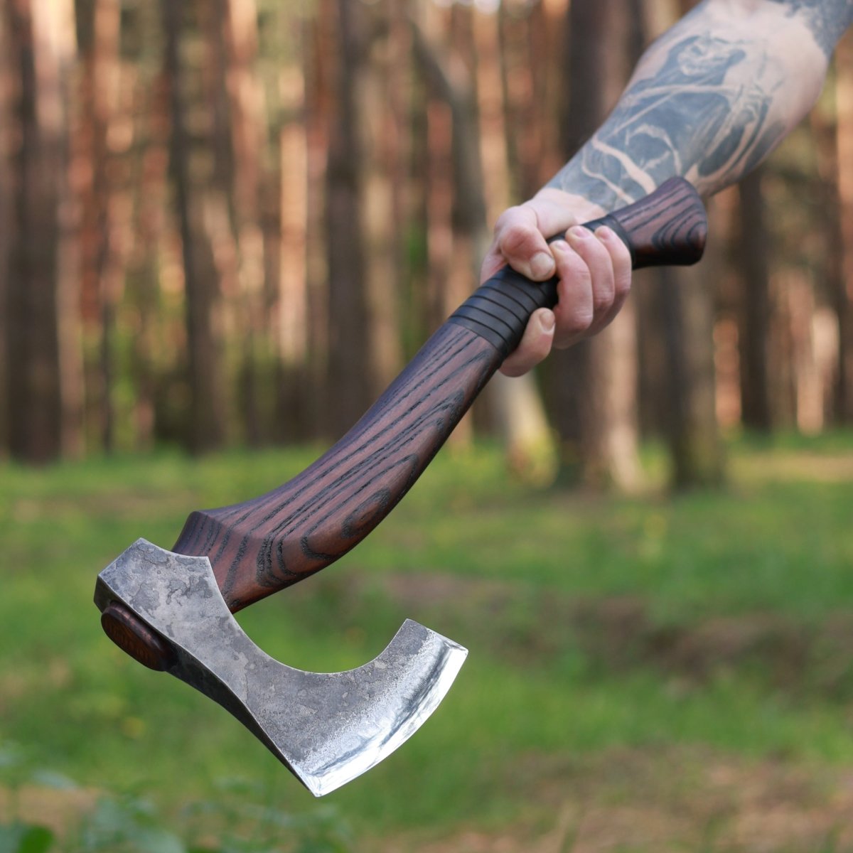 Hand forged Viking axe "Svart barbar" with carved handle from AncientSmithy