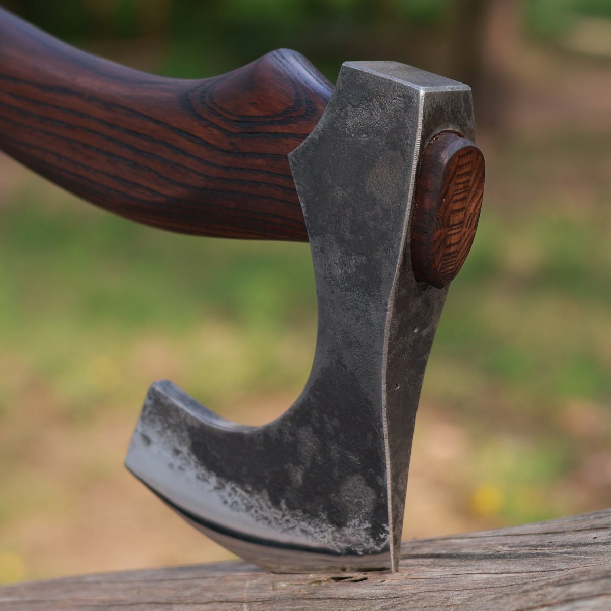 Hand forged Viking axe "Svart barbar" with carved handle from AncientSmithy