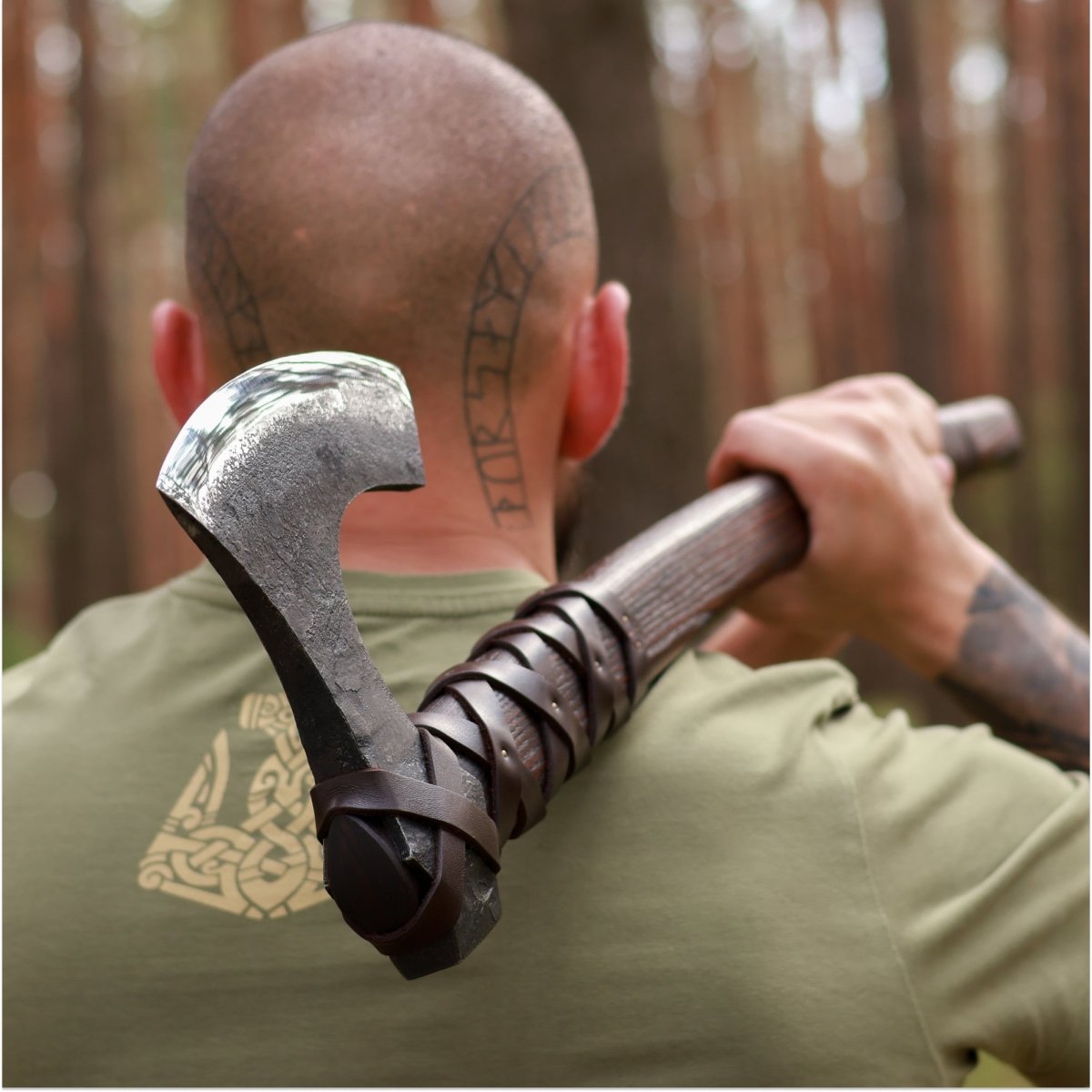 Viking long axe "Ragnar Lodbrok" with carving handle and leather wrap from AncientSmithy