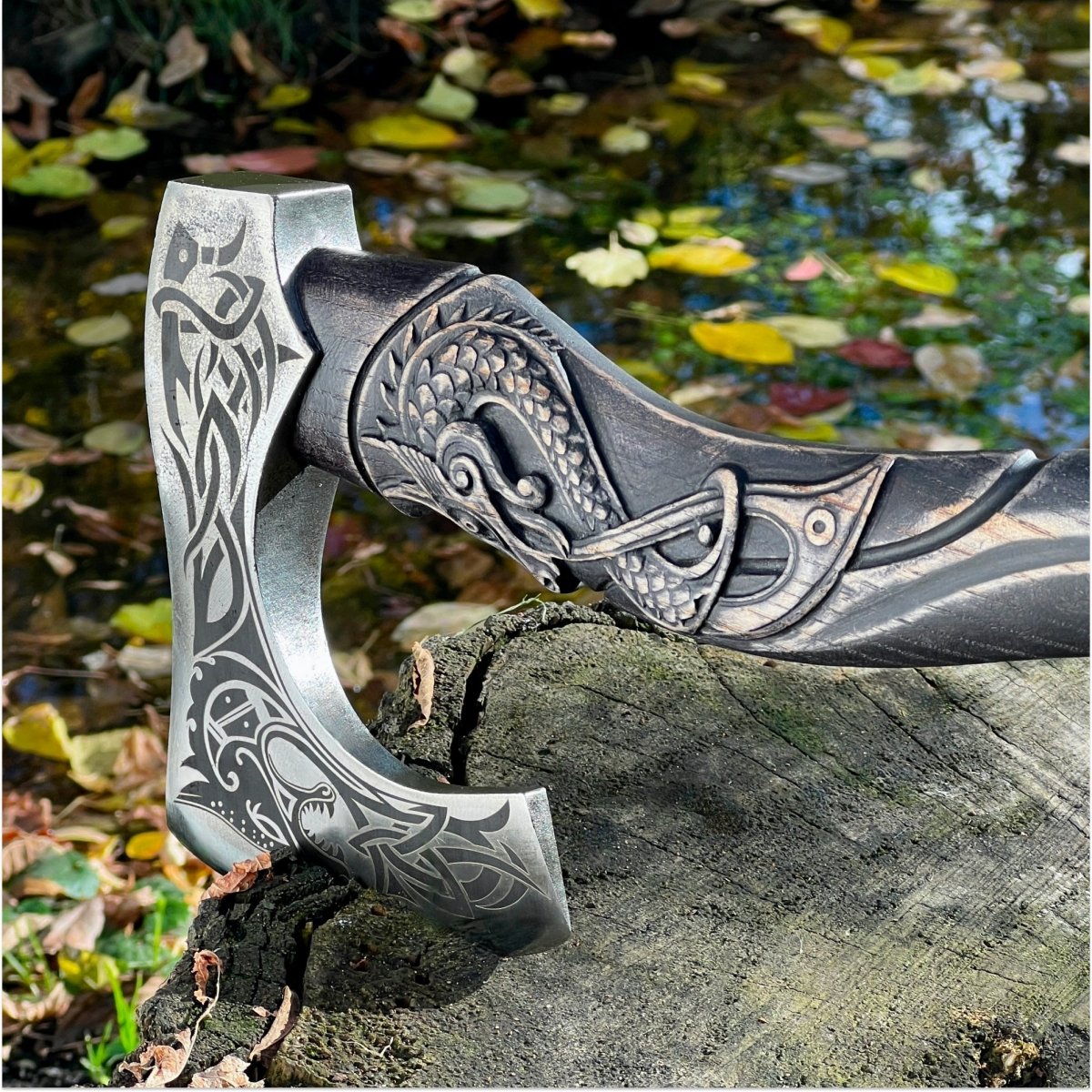 Hand-forged hardened bearded viking axe "Fenrisulfr" with carved handle from AncientSmithy