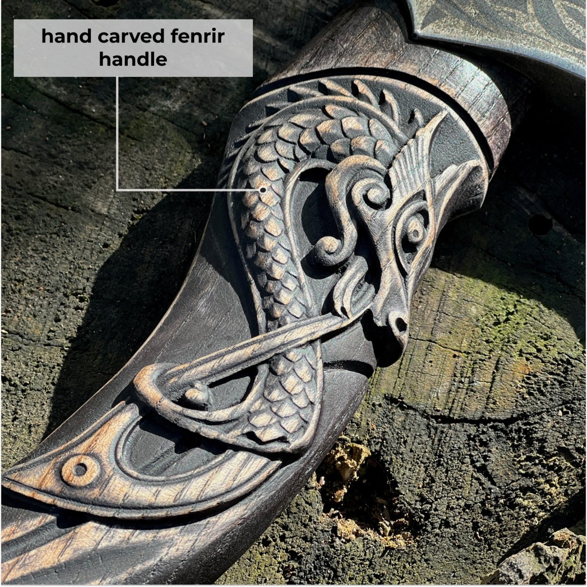 Hand-forged hardened bearded viking axe "Fenrisulfr" with carved handle from AncientSmithy