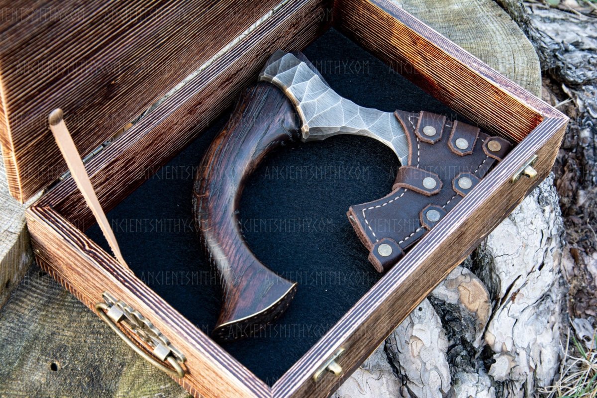 Hand forged hatchet "Skarpt nebb" with leather cover from AncientSmithy