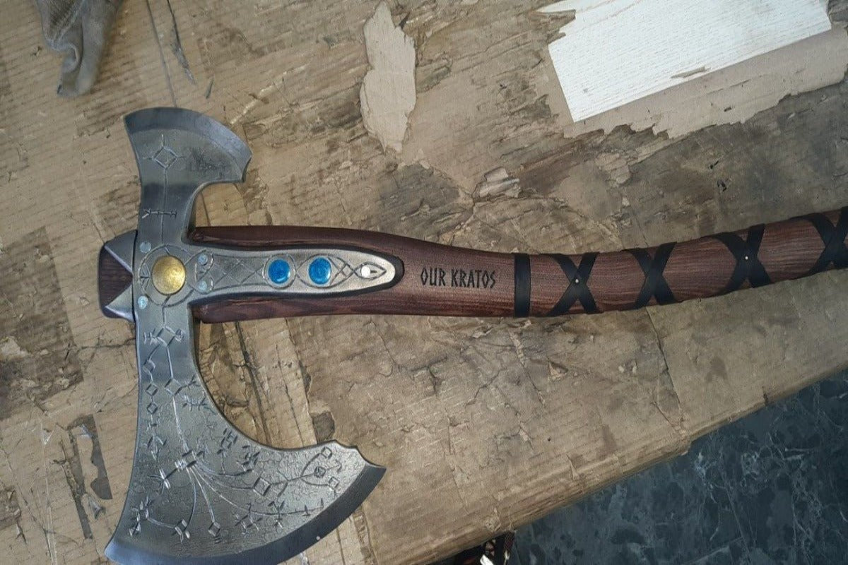 Hand-forged Leviathan axe with leather wrap from AncientSmithy