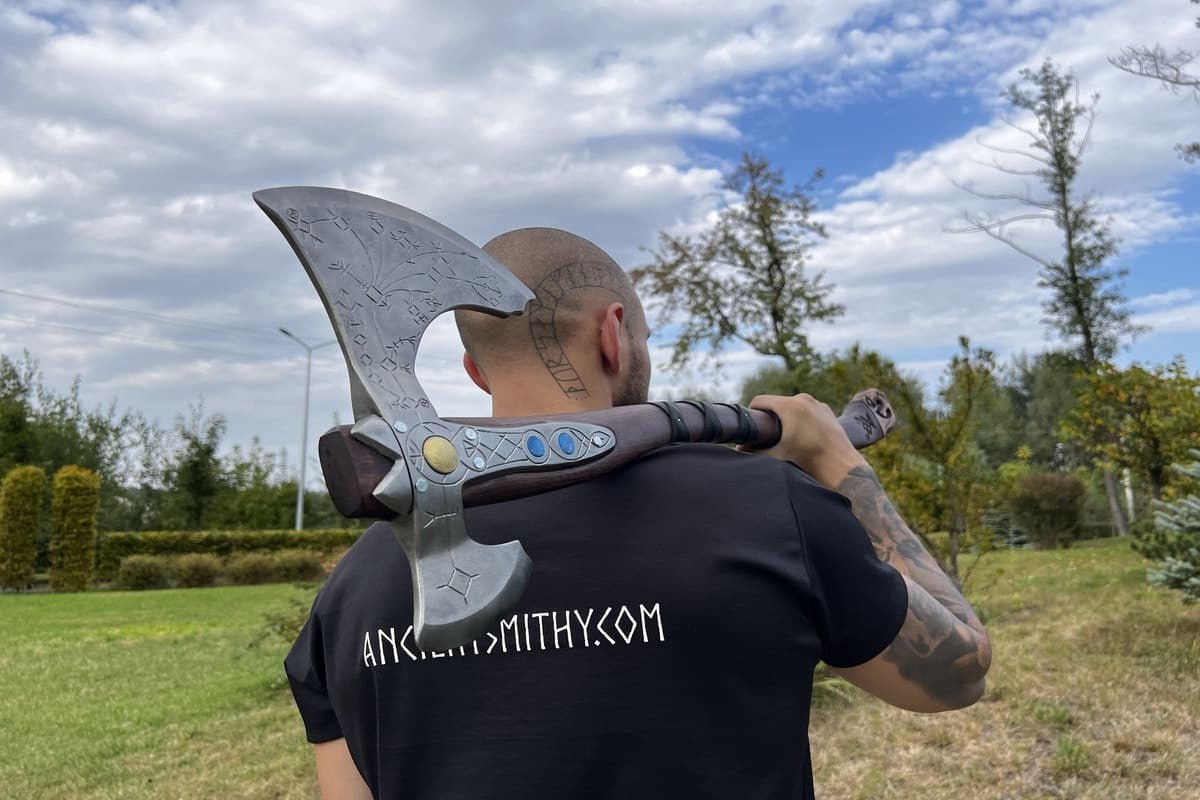 Hand-forged Leviathan axe with leather wrap from AncientSmithy