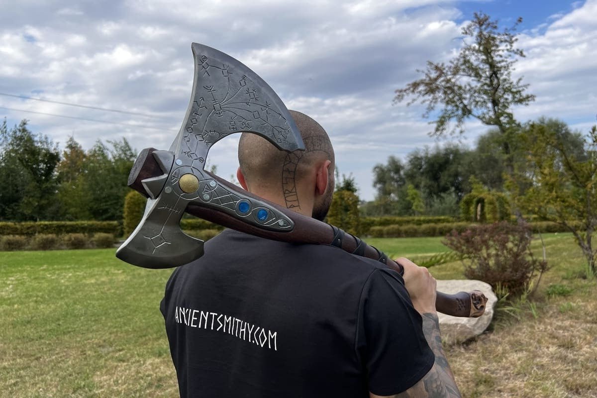 Hand-forged Leviathan axe with leather wrap from AncientSmithy