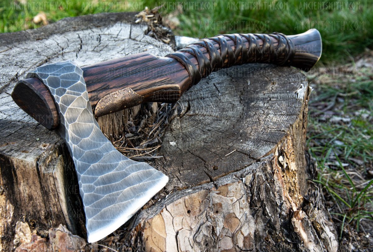 Hand Forged Viking Axe "Veles" with leather wrap on the handle from AncientSmithy